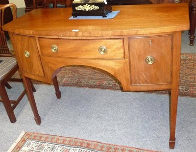 Lot 1468 - A Small George III Mahogany Bowfront Sideboard, early 19th century, the single frieze drawer...