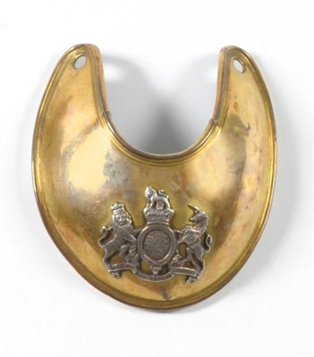 Lot 106 - A Georgian Copper Gilt Gorget, with reeded and rounded edge, set with a silver Royal Coat of...