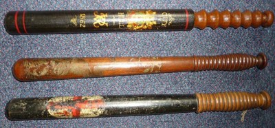 Lot 117 - A Victorian Walnut Truncheon by Barker, Holborn, painted with red cross on an oval white shield...