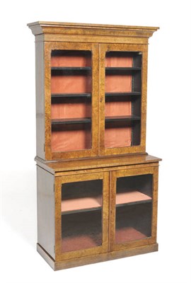 Lot 1471 - A Victorian Walnut Bookcase, late 19th century, the reverse ogee cornice above a plain frieze...