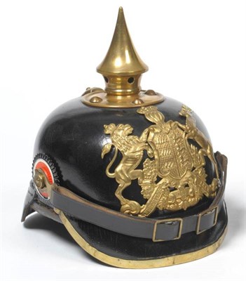 Lot 126 - A Wurttemberg Model 1895 Enlisted Man's Pickelhaube, in black leather, with brass spike, the helmet