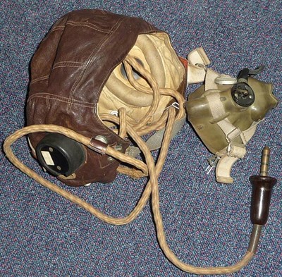 Lot 130 - A Second World War RAF Leather Flying Helmet, C Type, the bakelite earphones marked AM centred by a