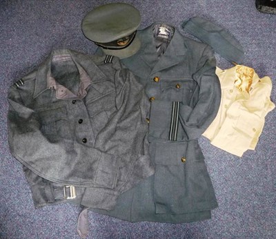 Lot 145 - An RAF Part Uniform to a Flight Lieutenant, comprising Service dress jacket with strap-on...