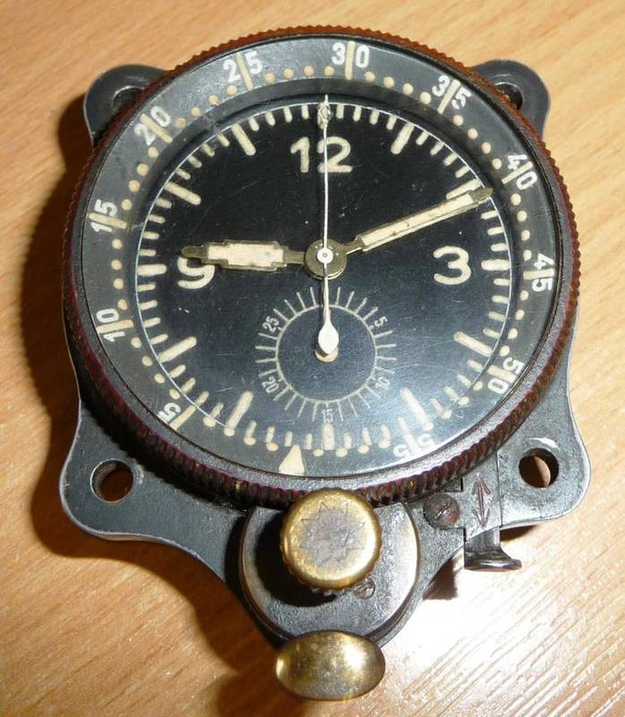 Lot 147 - A Second World War German Messerschmitt Bf 109 Cockpit Clock, circa 1940, the black dial and...