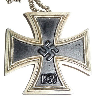 Lot 157 - A German Third Reich Iron Cross First Class, pin missing, now hung from a metal chain