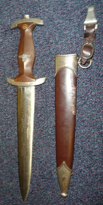 Lot 164 - A German Third Reich SA Dagger, the steel blade etched Alles fur Deutschland, with RZM logo...