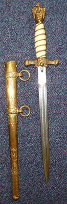 Lot 176 - A German Third Reich Naval Officer's Dirk, the possibly later double fullered steel blade...