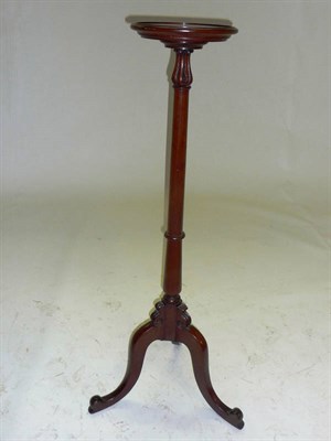 Lot 1478 - A Carved Mahogany Plant Pedestal, late 19th century, the circular moulded top with lappet...