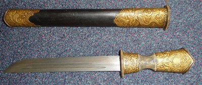 Lot 183 - A Chinese Dagger, the 21cm single edge steel blade with a narrow fuller to the top edge, the...