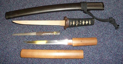 Lot 192 - A Japanese Koto Tanto in Futokorogatana Style, the 18.5cm steel blade with narrow fuller to the top