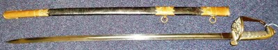 Lot 242 - A Victorian Junior Naval Officer's Sword, the 76cm plain single edge fullered steel blade...