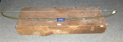 Lot 250 - A 1950's Archery Set, comprising a grey painted laminated wood bow and a box of aluminium...