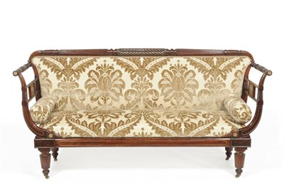 Lot 1487 - A Regency Mahogany and Brass Strung Settee, early 19th century, upholstered in grey and cream...