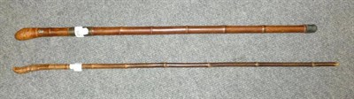 Lot 278 - A Georgian Bamboo Sword Cane, the 68cm single edge steel blade with a narrow fuller to the back...