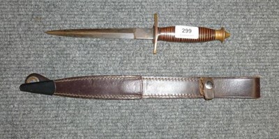 Lot 299 - A Copy of a US V-42 Stiletto, the 18.5cm blued double edge steel blade with ribbed thumb depression