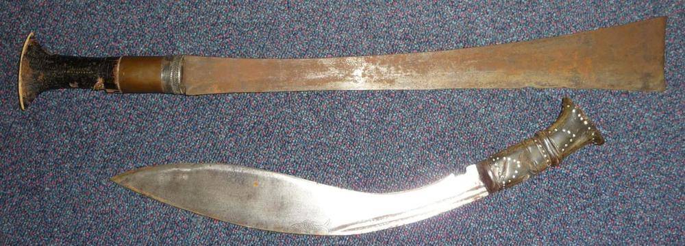 Lot 302 - A Naga, Assam Dao, the 46cm single edge steel blade with square end, the hilt with a copper...