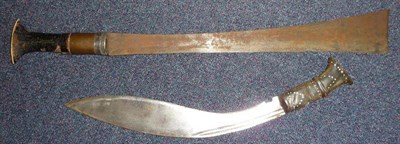 Lot 302 - A Naga, Assam Dao, the 46cm single edge steel blade with square end, the hilt with a copper...