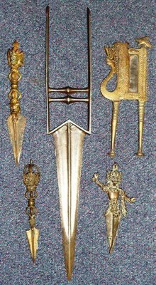 Lot 308 - An Indian Katar, the blade with raised medial ridge, the side bars joined by two baluster grips; an