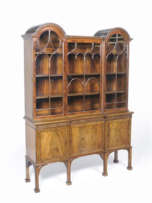 Lot 1492 - A Chippendale Style Display Cabinet, early 20th century, the upper section with two conforming...