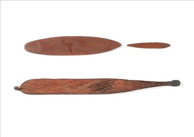 Lot 316 - A 19th Century Australian Aborigine Woomera (Spear Thrower),  in dark brown wood with traces of red