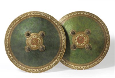 Lot 318 - A Good Pair of 19th Century Indo/Persian Leather Dhals, each of convex circular form, the green...