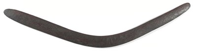 Lot 325 - A 19th Century Australian Aborigine Fighting Stick (Boomerang), of rich brown patination, each side