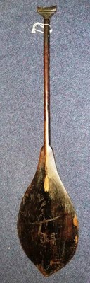 Lot 362 - A Borneo Wood Paddle, with large flat and rounded leaf shape blade, cylindrical haft and T...