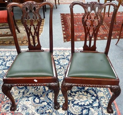 Lot 1497 - A Set of Twelve Chippendale Style Dining Chairs, early 20th century, the shaped top rail with...