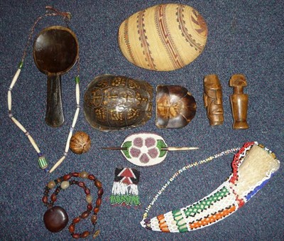 Lot 374 - A Small Collection of Ethnographica, including a North American Indian beadwork and porcupine quill