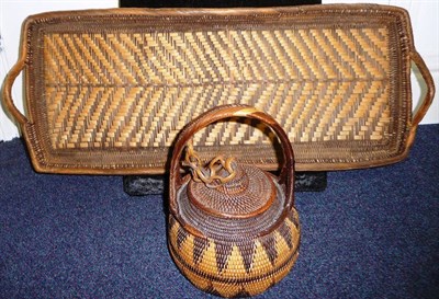 Lot 376 - A Papua New Guinea Wicker Basket and Cover, of globular form, woven with bands of chevrons in...