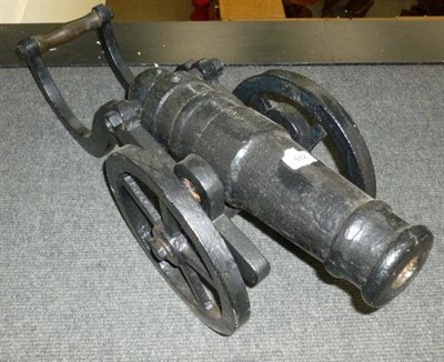 Lot 512 - A 19th Century Small Black Painted Cast Iron Signal Cannon, the 39cm double ringed barrel with...