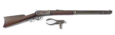 Lot 517 - A Winchester Model 1894 32.40 Rifle, the 66cm octagonal steel barrel stamped with maker's name...