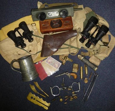 Lot 55 - A Quantity of Militaria, including a pair of military issue Hyatt handcuffs, Trench Art...