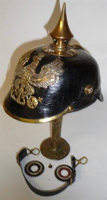 Lot 91 - A Prussian Officer's 1871 Pattern Pickelhaube, the leather skull with stamped brass helmet...