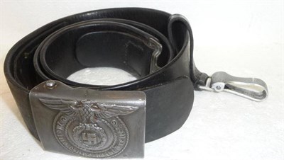 Lot 109 - A German Third Reich SS Aluminium Buckle, unmarked, with leather belt and aluminium clip...