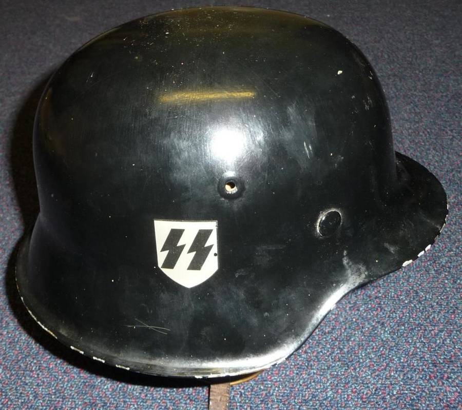 Lot 130 - A German M1942 Steel Helmet,  with eight tongue leather liner and chin strap