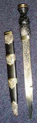 Lot 156 - A Scottish Dirk, the single edge steel blade etched with thistles and other foliage, the...