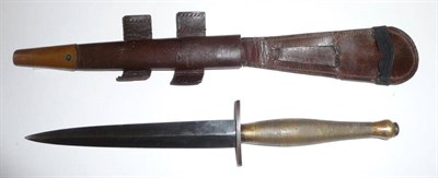 Lot 169 - A Second Pattern Commando/Fighting Knife, with hand forged blued steel blade, the crossguard...