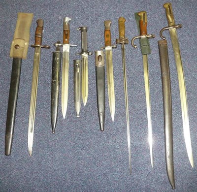 Lot 174 - Seven Bayonets:- a French Model 1866 ";Chassepot"; Yataghan Sword bayonet, the St Etienne blade...