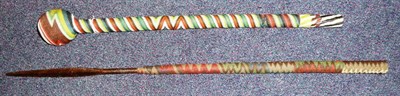 Lot 222 - A Zulu Knobkerrie, with globular head and cylindrical haft, bound all over with woven brightly...