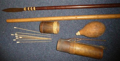 Lot 226 - A Borneo Hardwood Sumpitan (Blowpipe), with swollen mouthpiece, a steel spearhead bound to the...