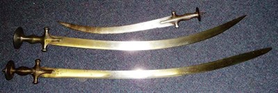 Lot 232 - An 18th Century Indian Talwar, with 83cm single edge curved steel blade, the steel hilt inlaid with