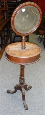 Lot 1542 - A Victorian Walnut Shaving Stand, late 19th century, the circular bevel glass mirror within a...