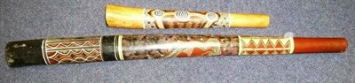 Lot 263 - An Australian Aborigine Didgeridoo, the tapering cylindrical body with pointillism decoration...