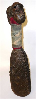 Lot 278 - A Benin Bronze Hand Bell/Gong, hollow cast as a Janus figure, the tall neck wrapped in coarse woven