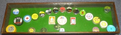 Lot 302 - A Display of Air Rifle Pellet Tins, set on green baize in a glazed case, 33cm by 107cm