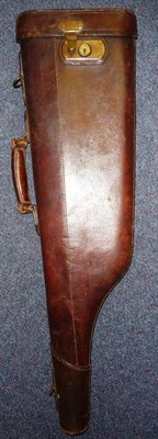 Lot 304 - A Stitched Leather Leg o' Mutton Shotgun Case, with brass mounts and lock, fitted to take...