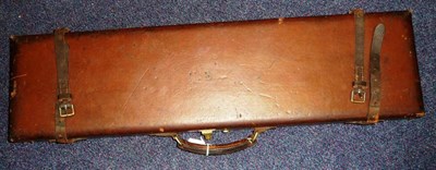 Lot 305 - A Stitched Leather Shotgun Case, with brass lock and clasp, the green baize lined interior...