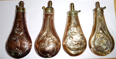 Lot 309 - Two Copper Powder Flasks, one embossed with a pheasant perched on a wheat sheaf, the other embossed