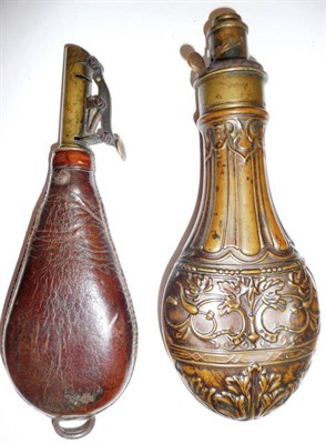 Lot 312 - A Copper Powder Flask by G & J W Hawkesley, Sheffield, with fluted neck, the body embossed with...